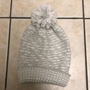 Grey and white knit Pom Pom hat.